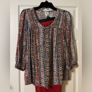 Women’s dress shirt with slacks,